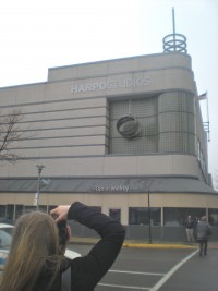 A person standing in front of a building