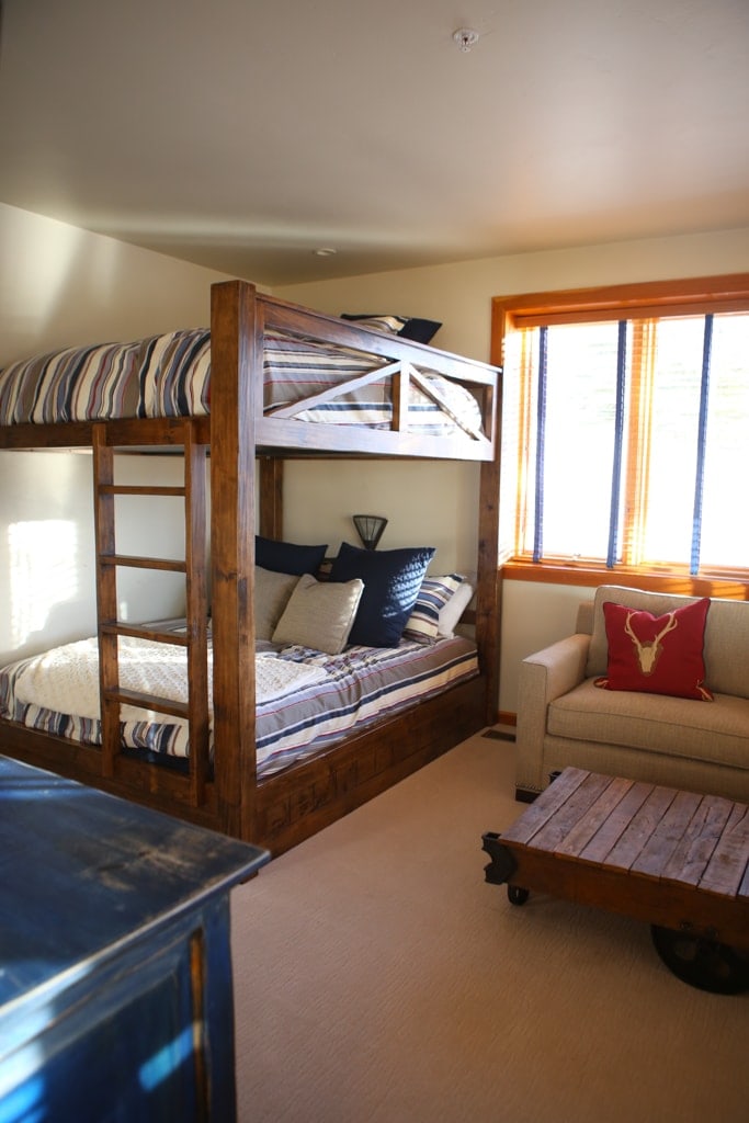A bedroom with a bunk bed