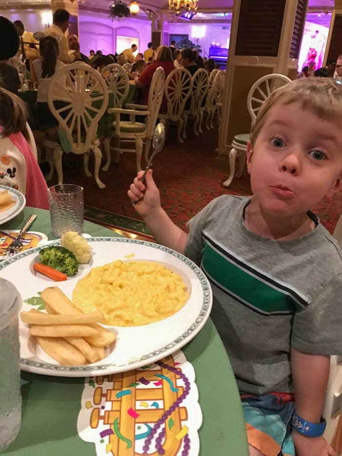 Blake eating at a table