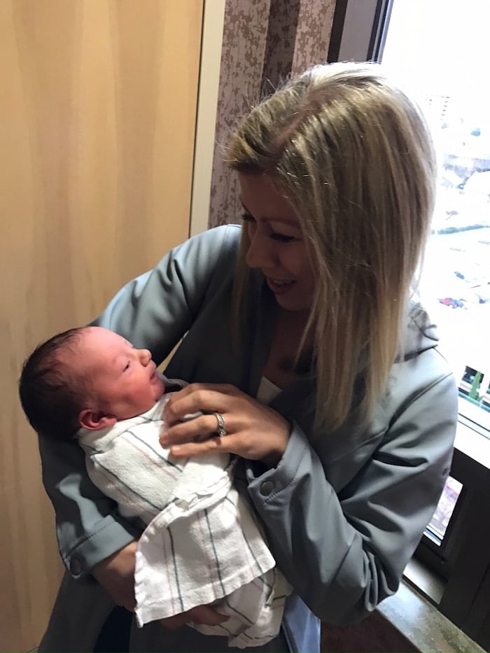 Lauren holding a baby