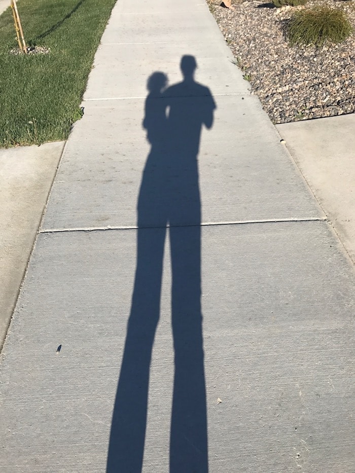 Lauren holding Eddie shadow
