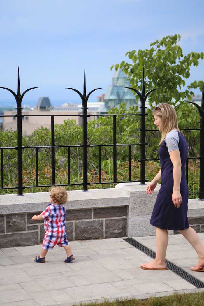 Lauren and Eddie in front of a fence