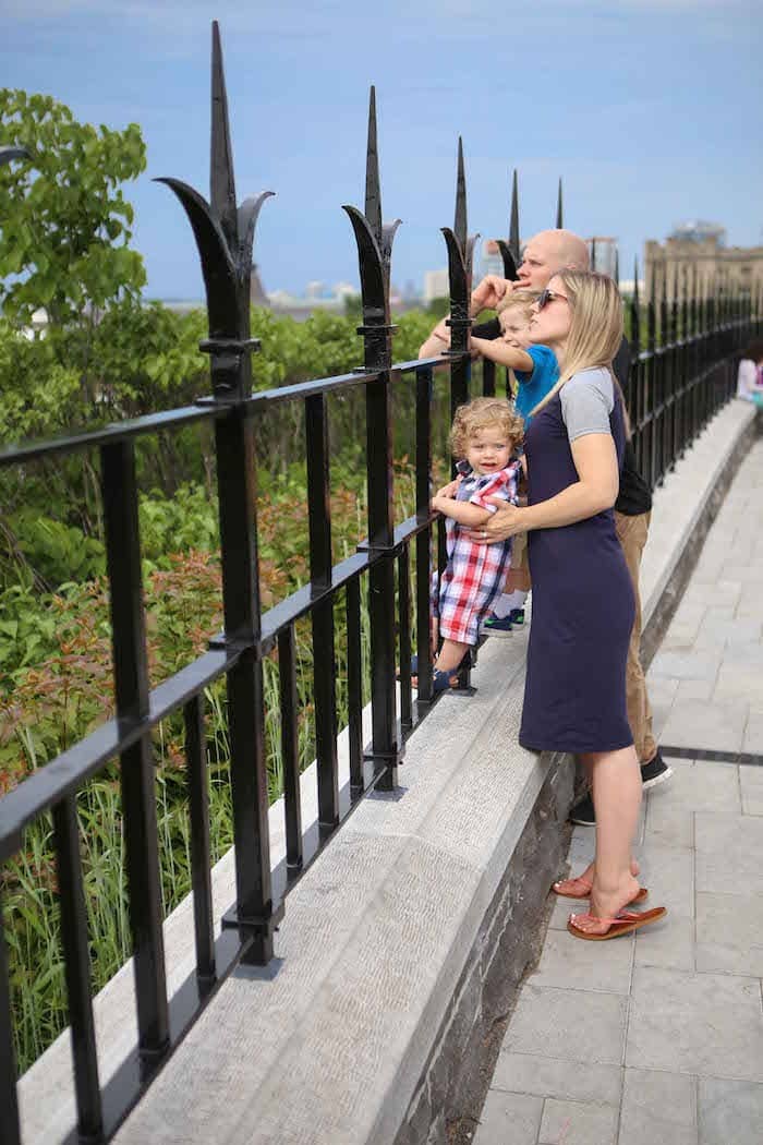 Brennan family standing next to a fence
