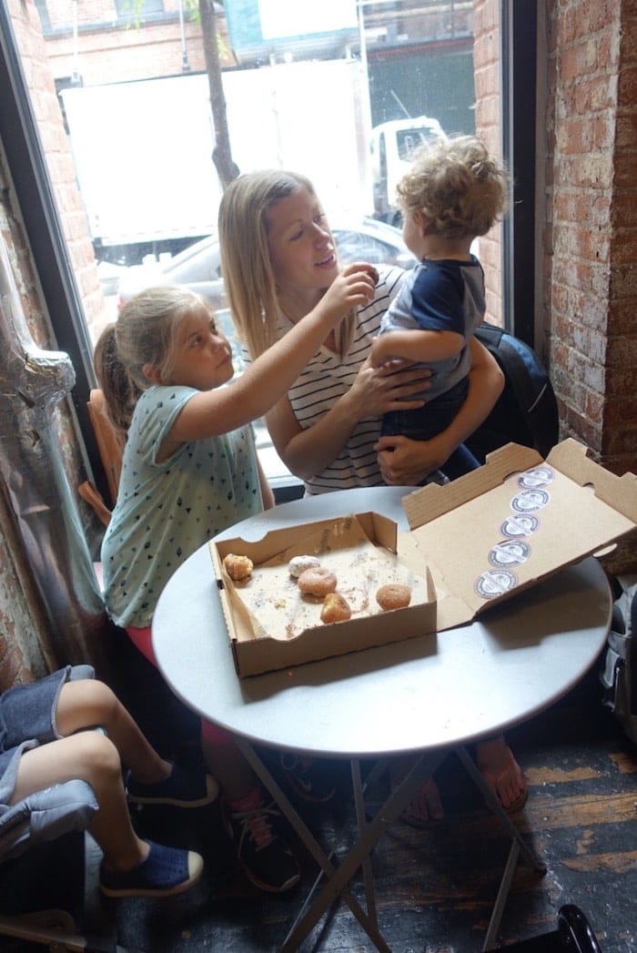 Lauren and the kids trying food
