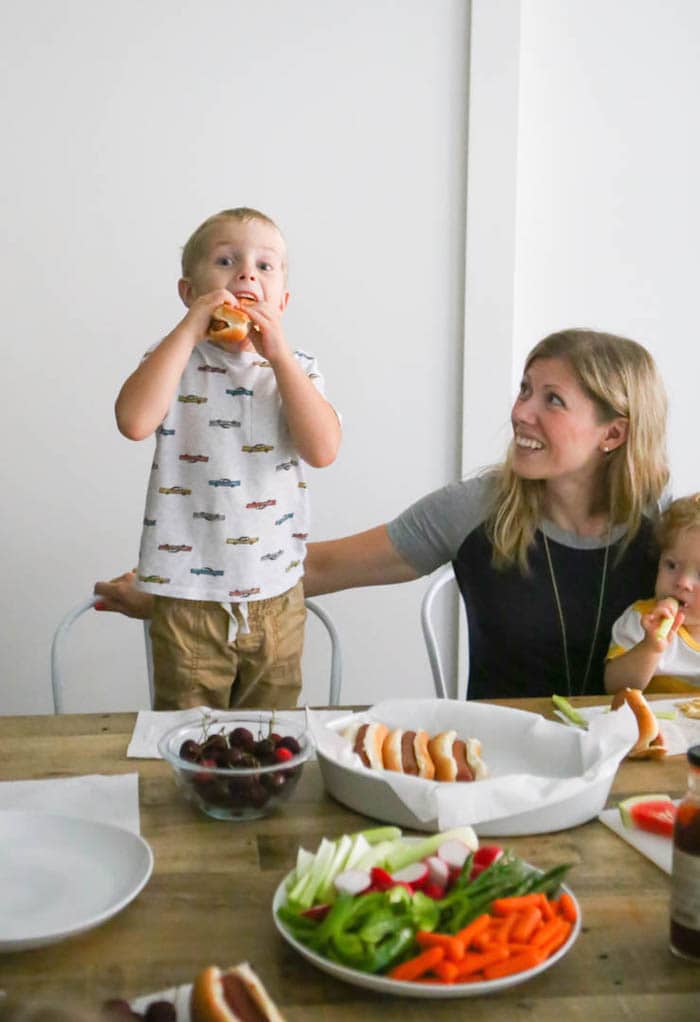 Blake taking a bite of food