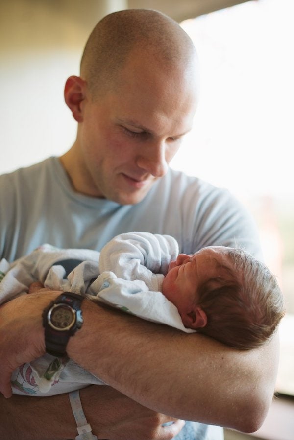A man holding a baby