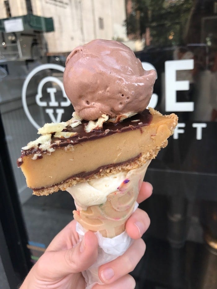 Ice cream cone with cheesecake on top