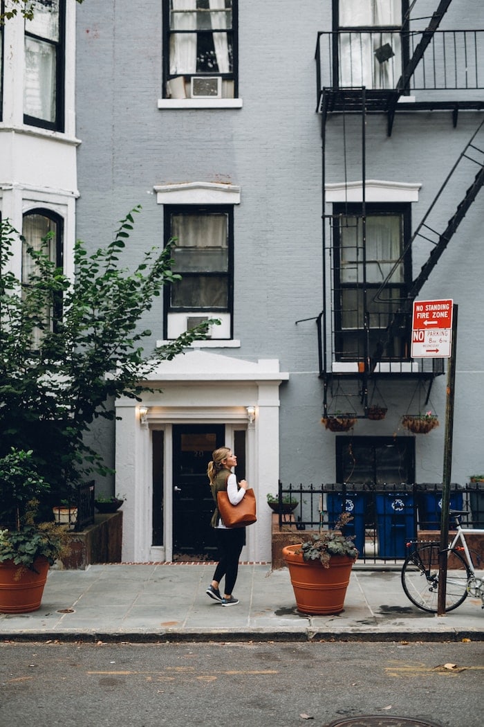 Lauren in front of a building