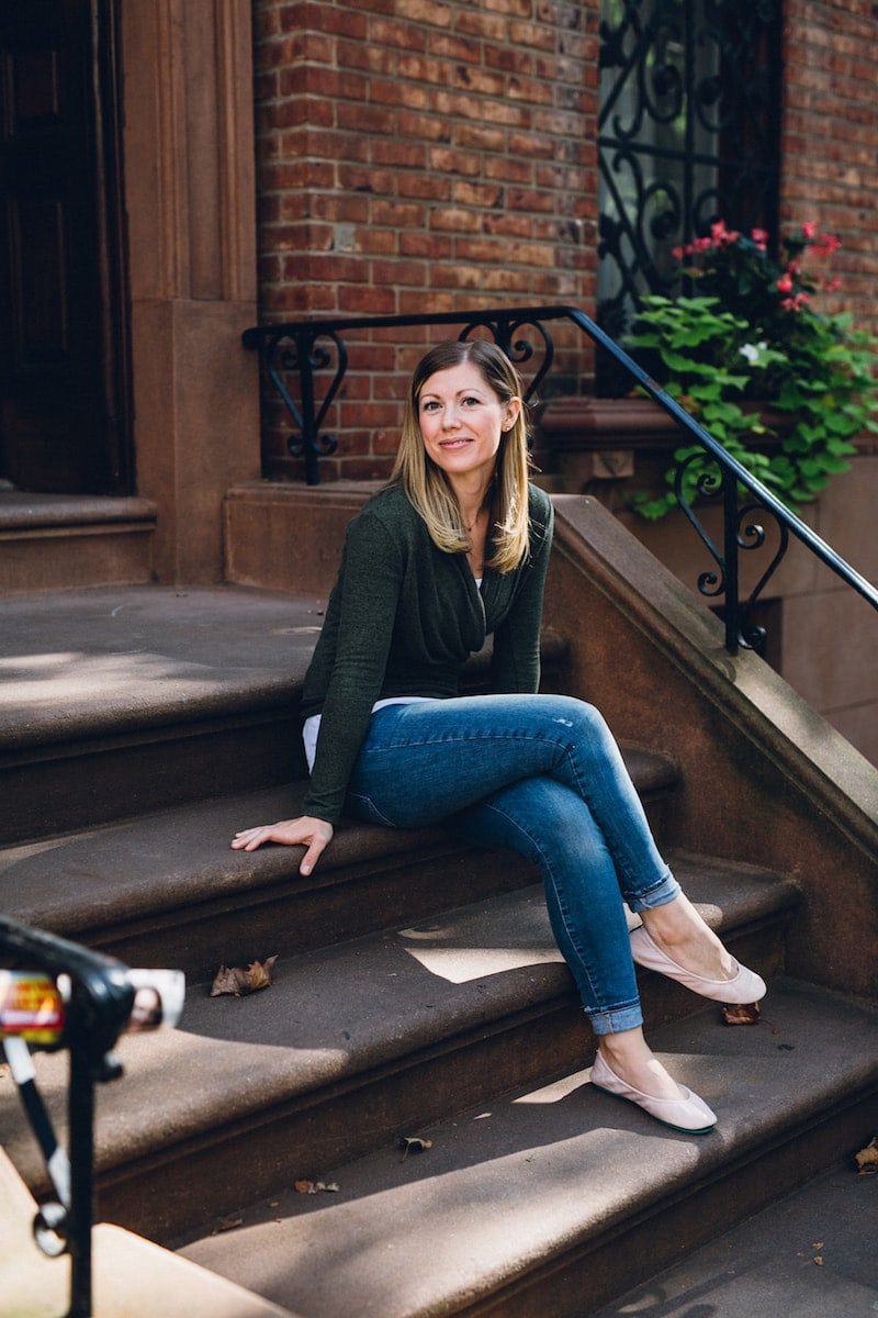 Lauren sitting on steps