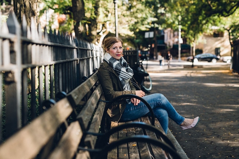 A person sitting on a bench