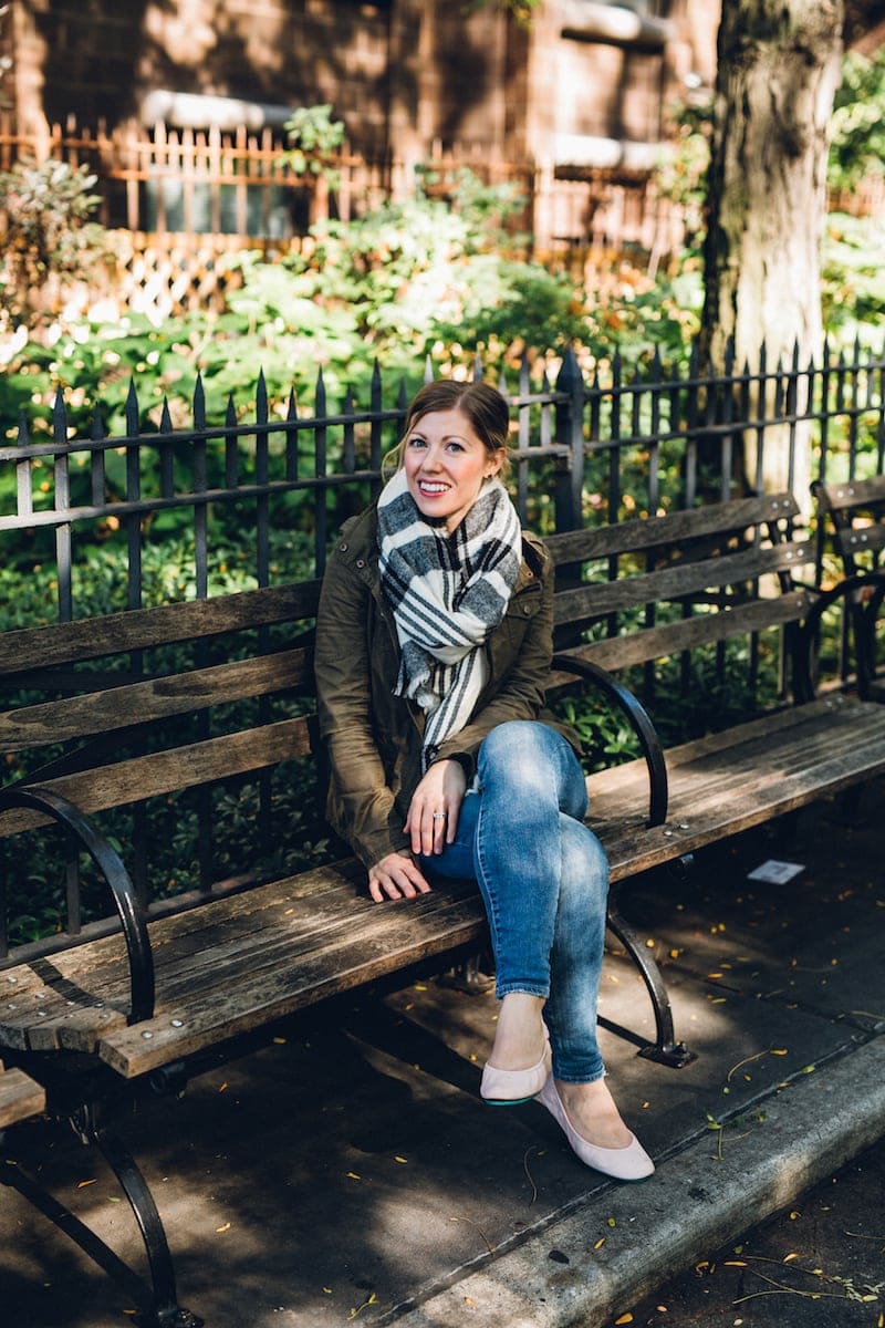 A person sitting on a park bench