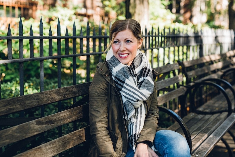 A person sitting on a park bench