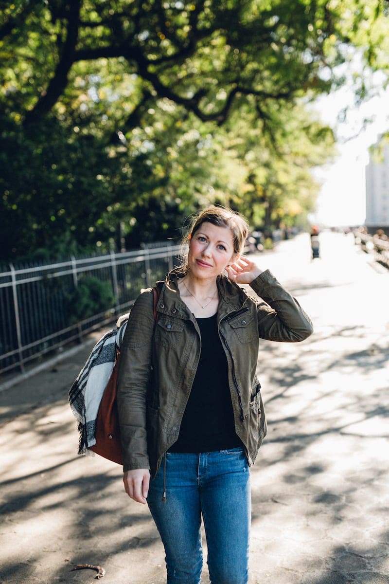 A person walking down a sidewalk