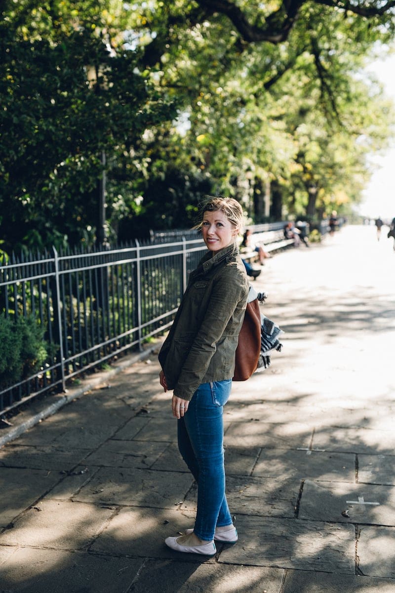 A person walking down a sidewalk