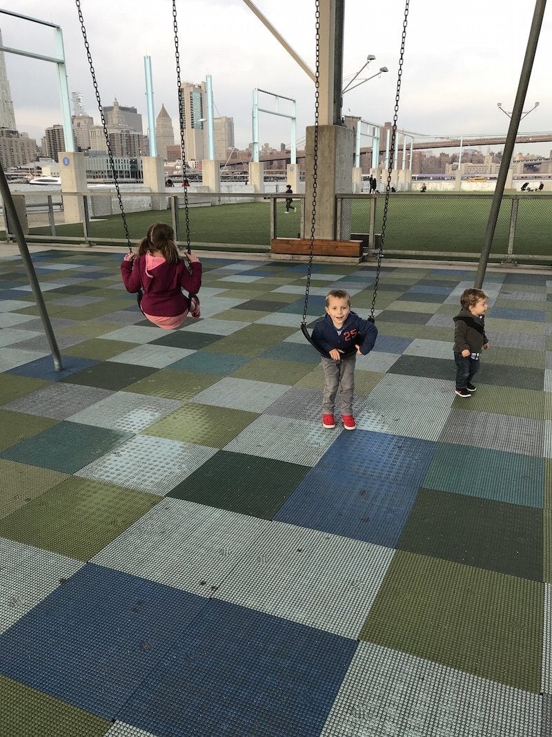 Brennan kids swinging