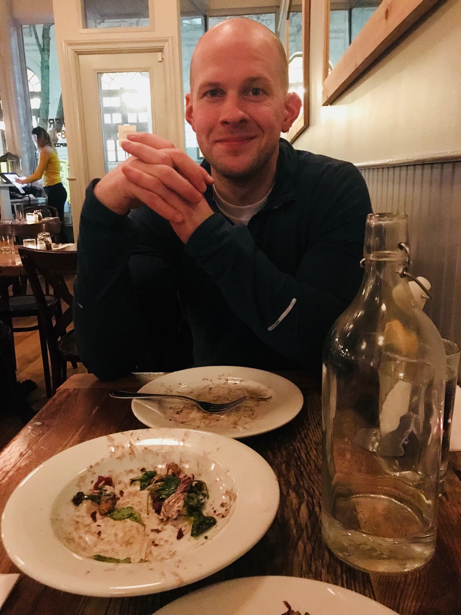 Gordon sitting at a table with food
