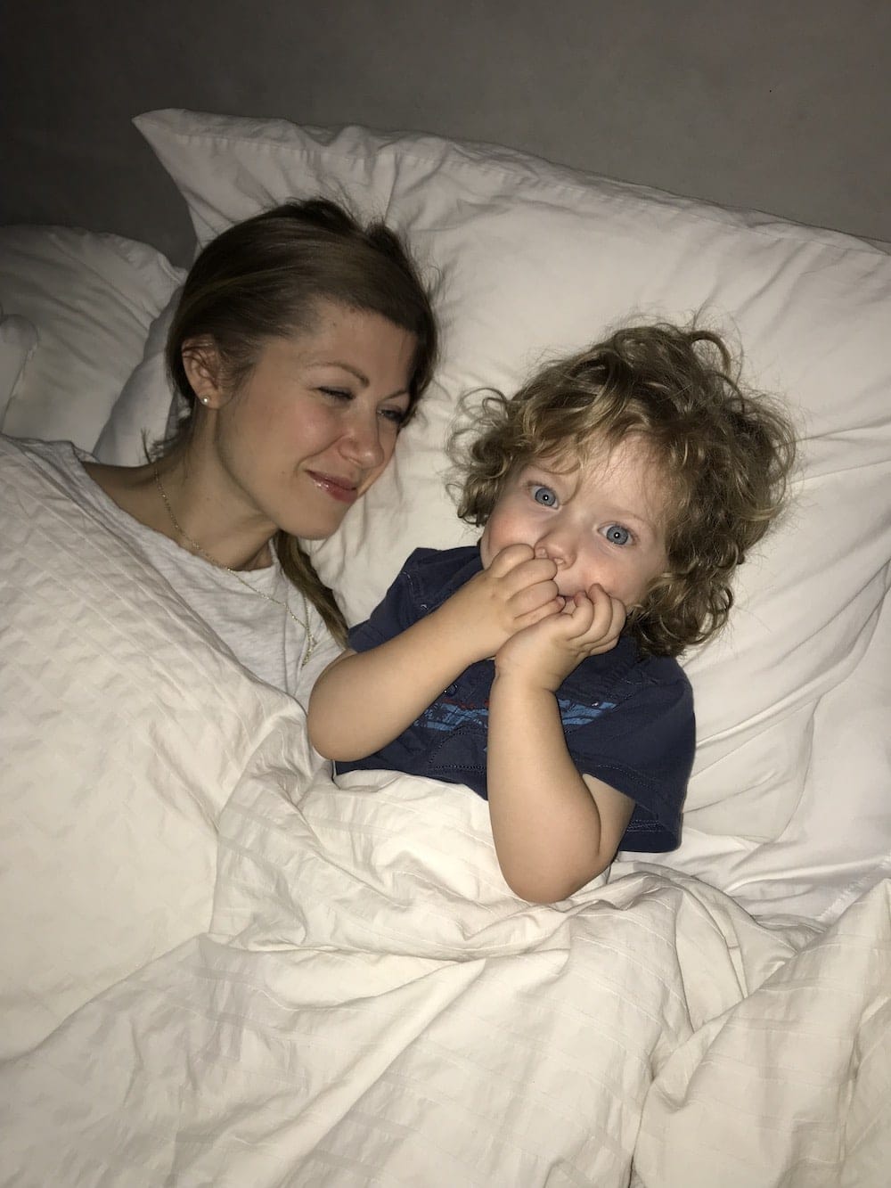 Lauren and Eddie laying in bed