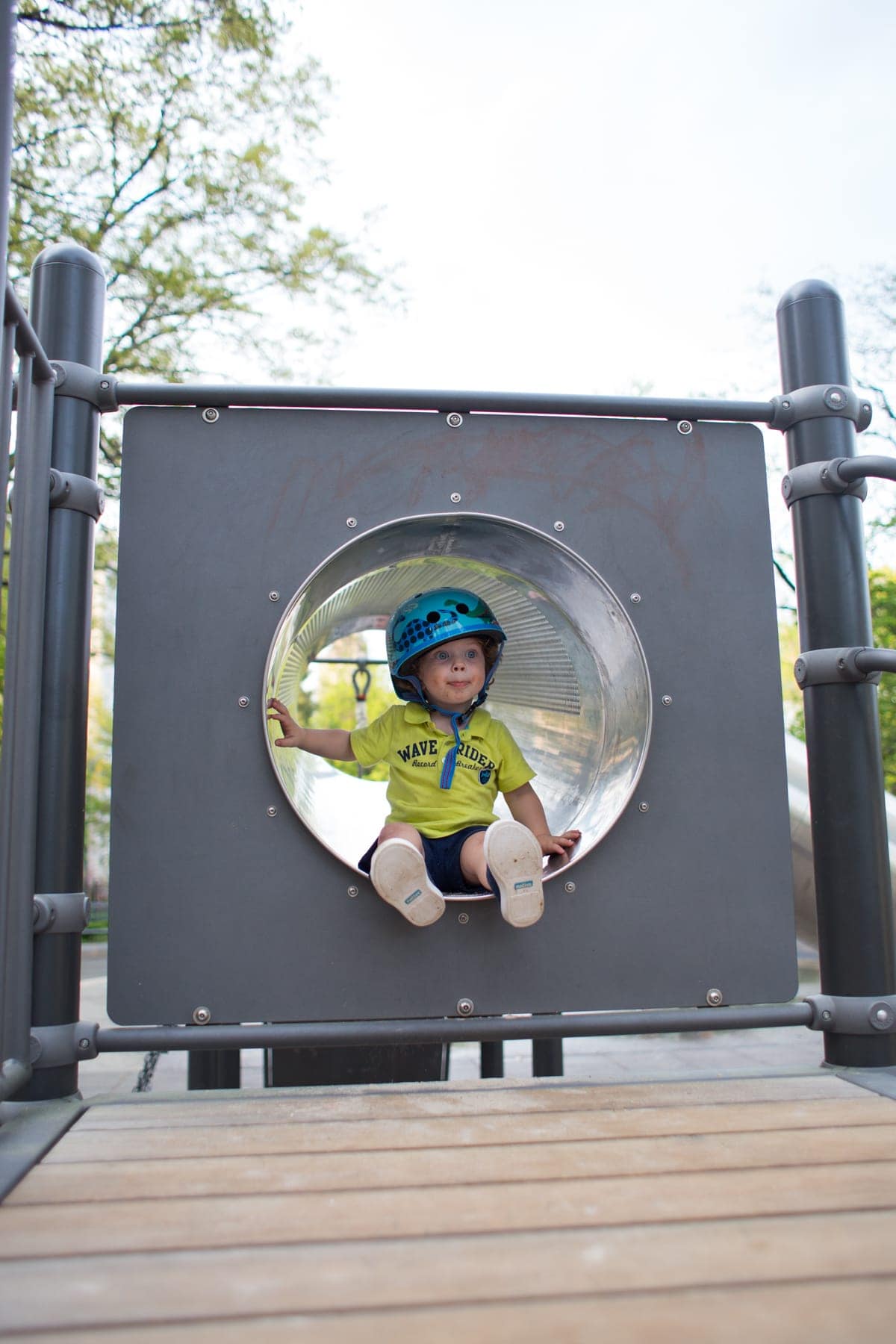 Eddie playing on a play structure