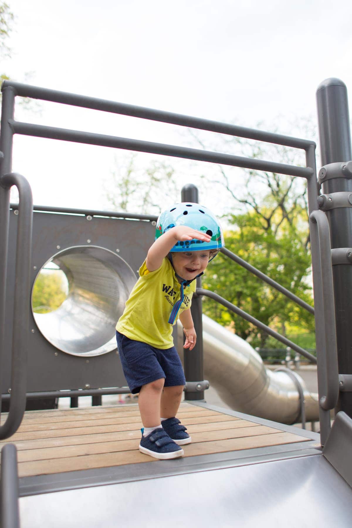 Eddie playing on a play structure