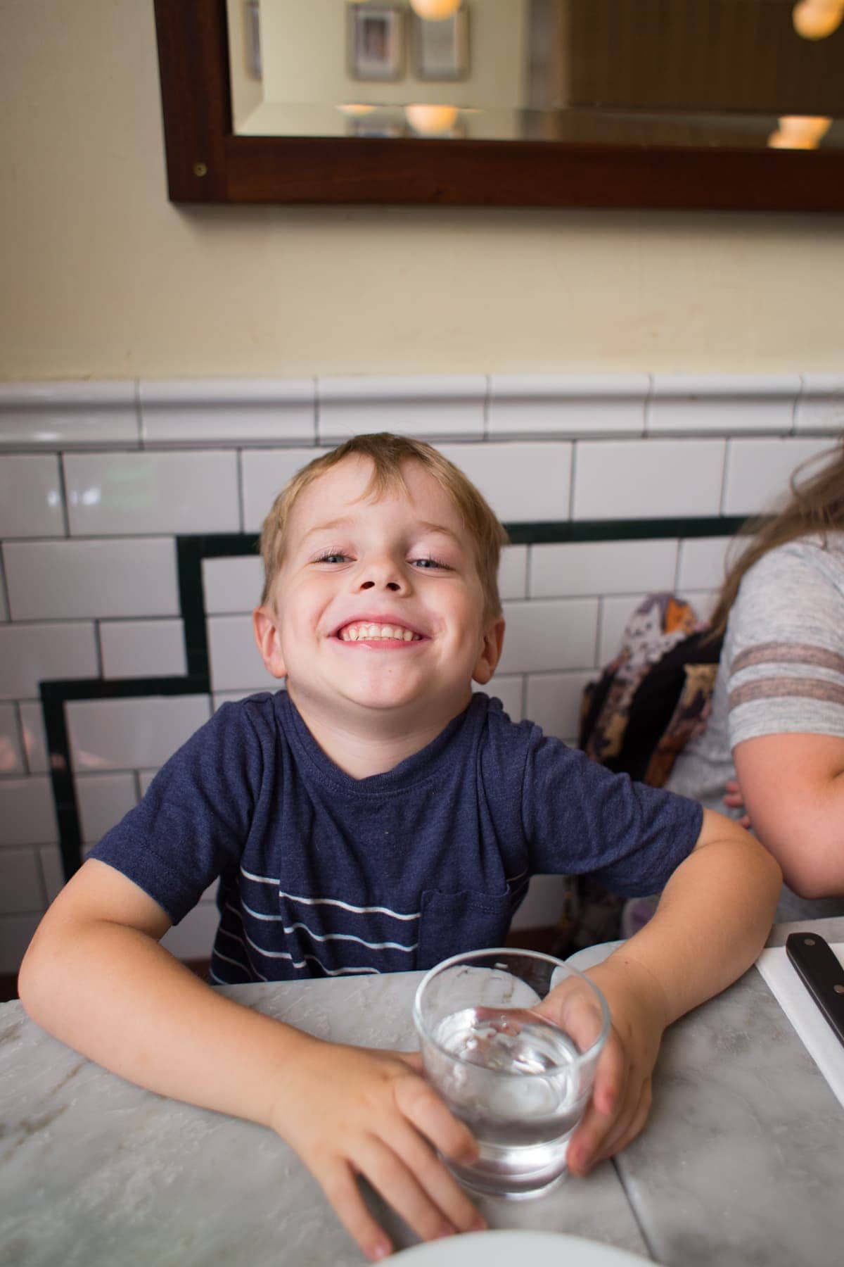 Blake sitting at a table