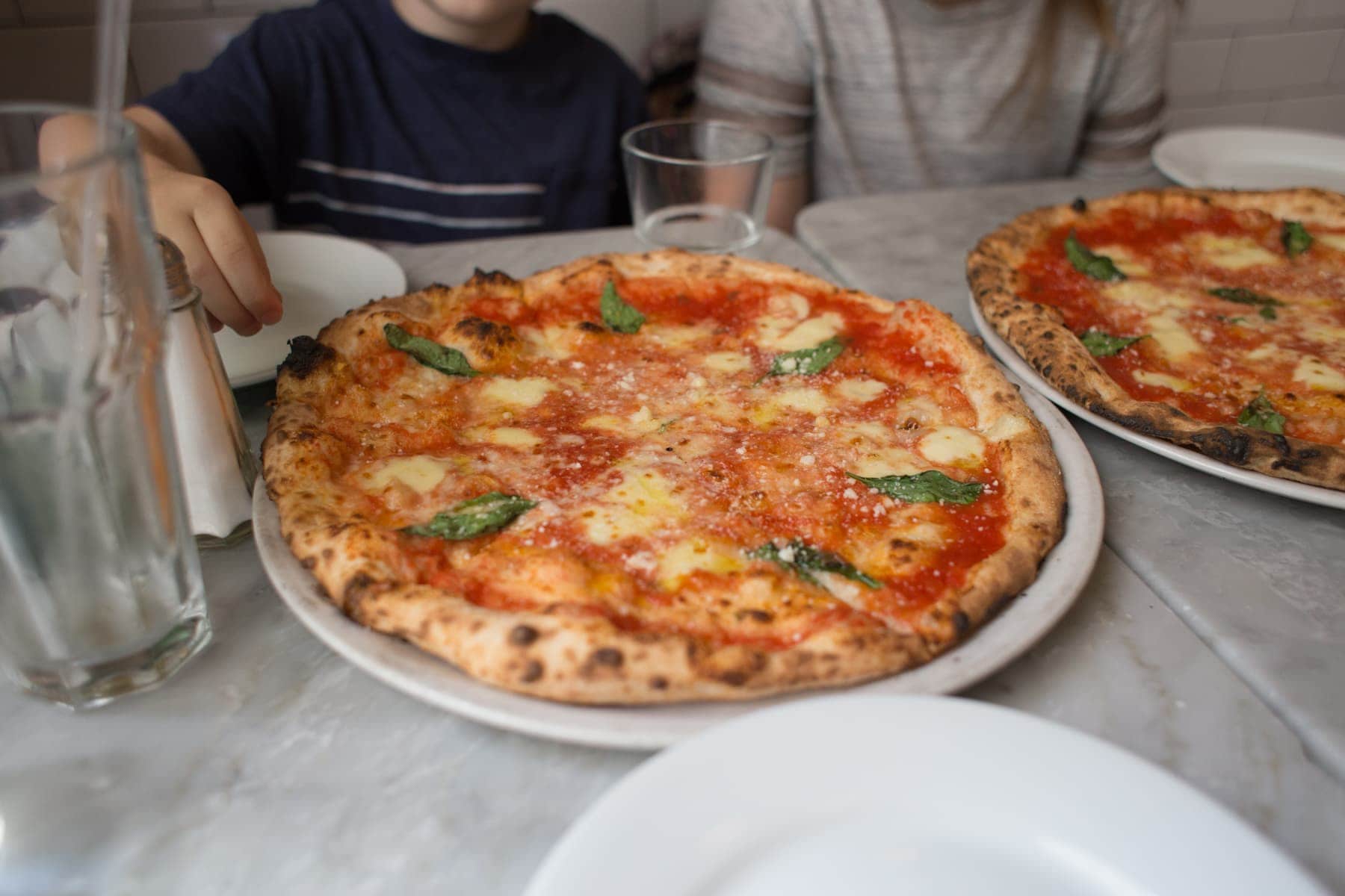 A pizza sitting on top of a table