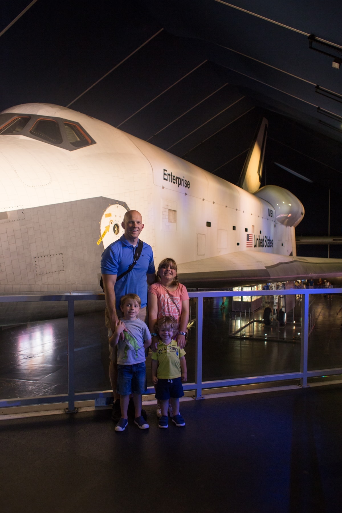 Gordon and the kids in front of a plane