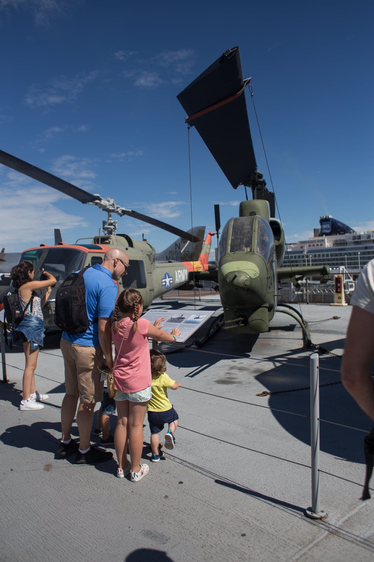Gordon and the kids in front of a helicopter