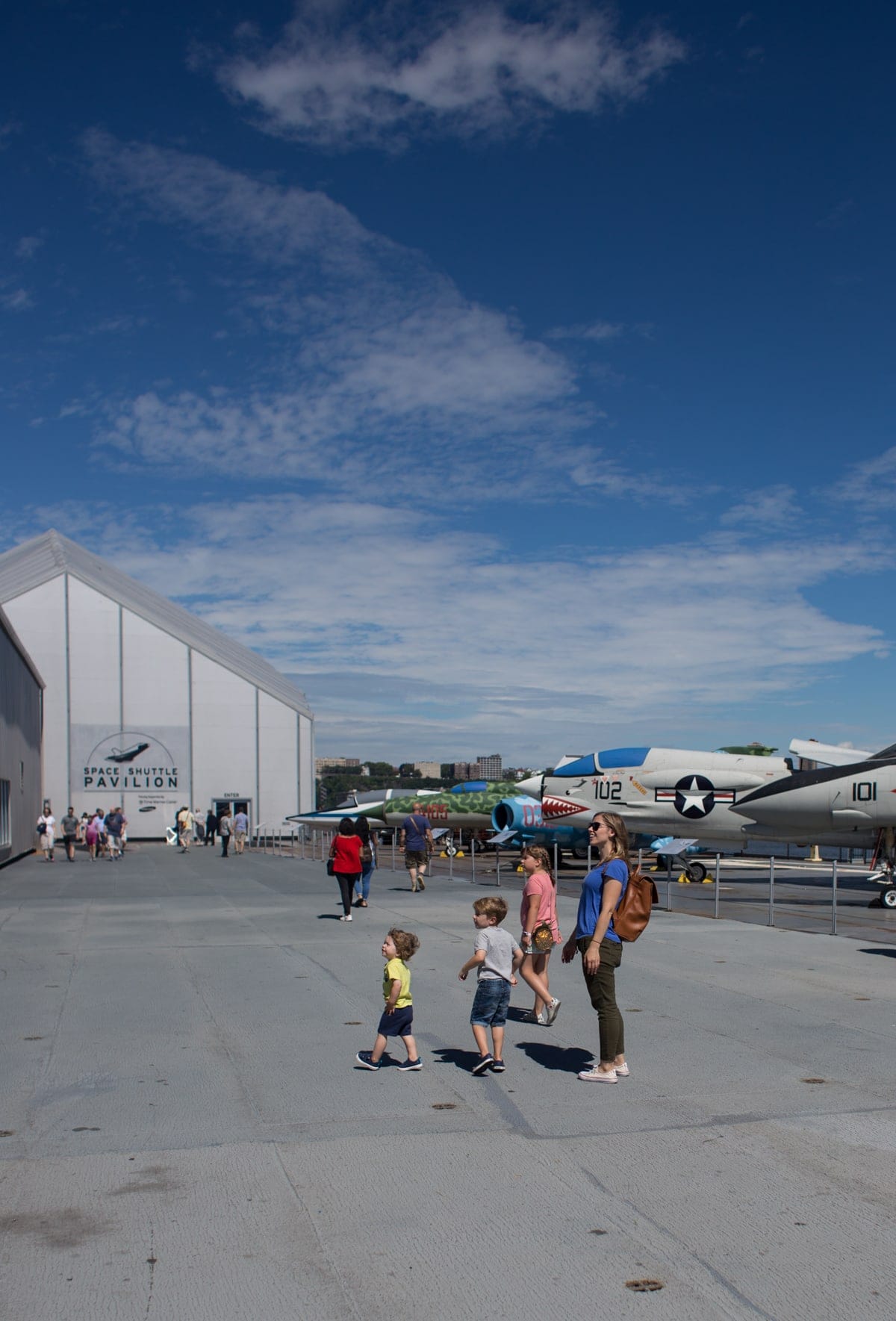 Brennan Family in front of planes