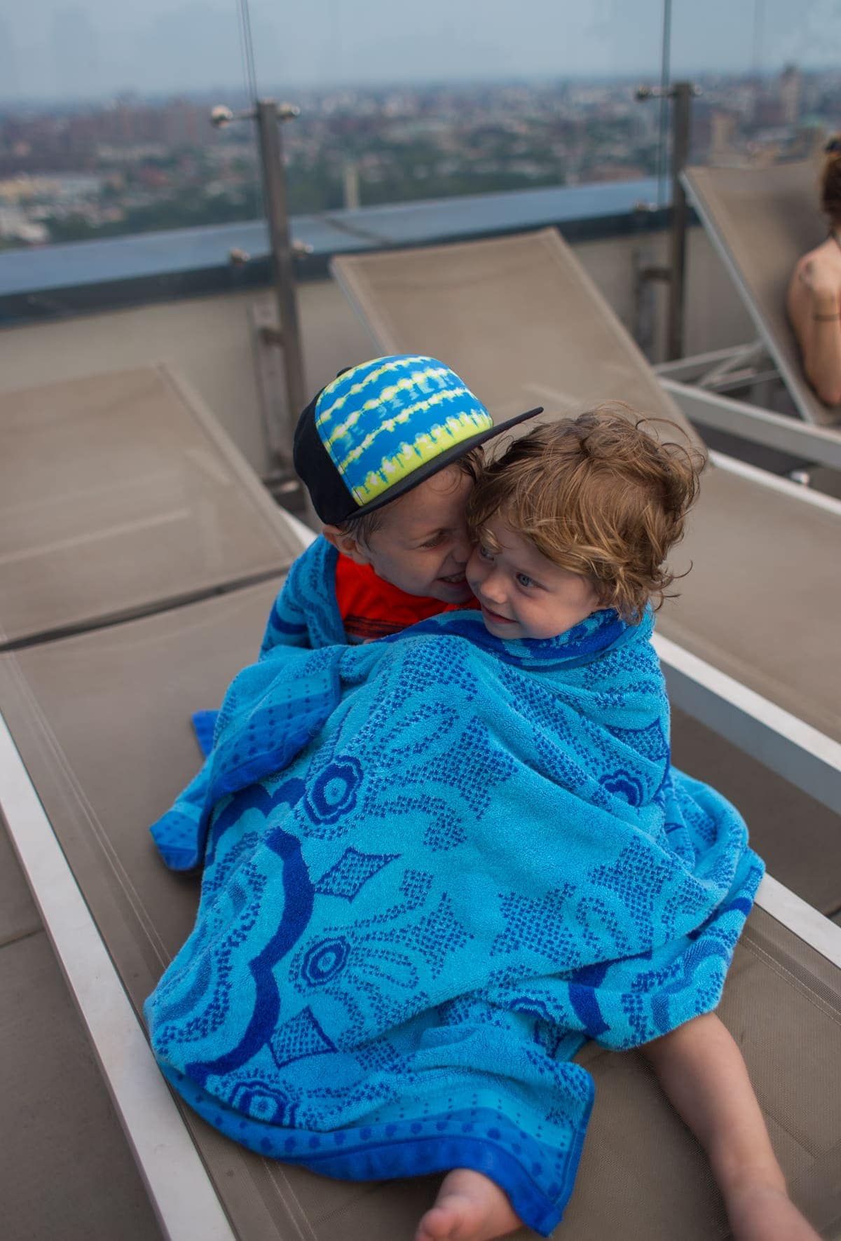 Eddie and Blake wrapped up in a blue towel