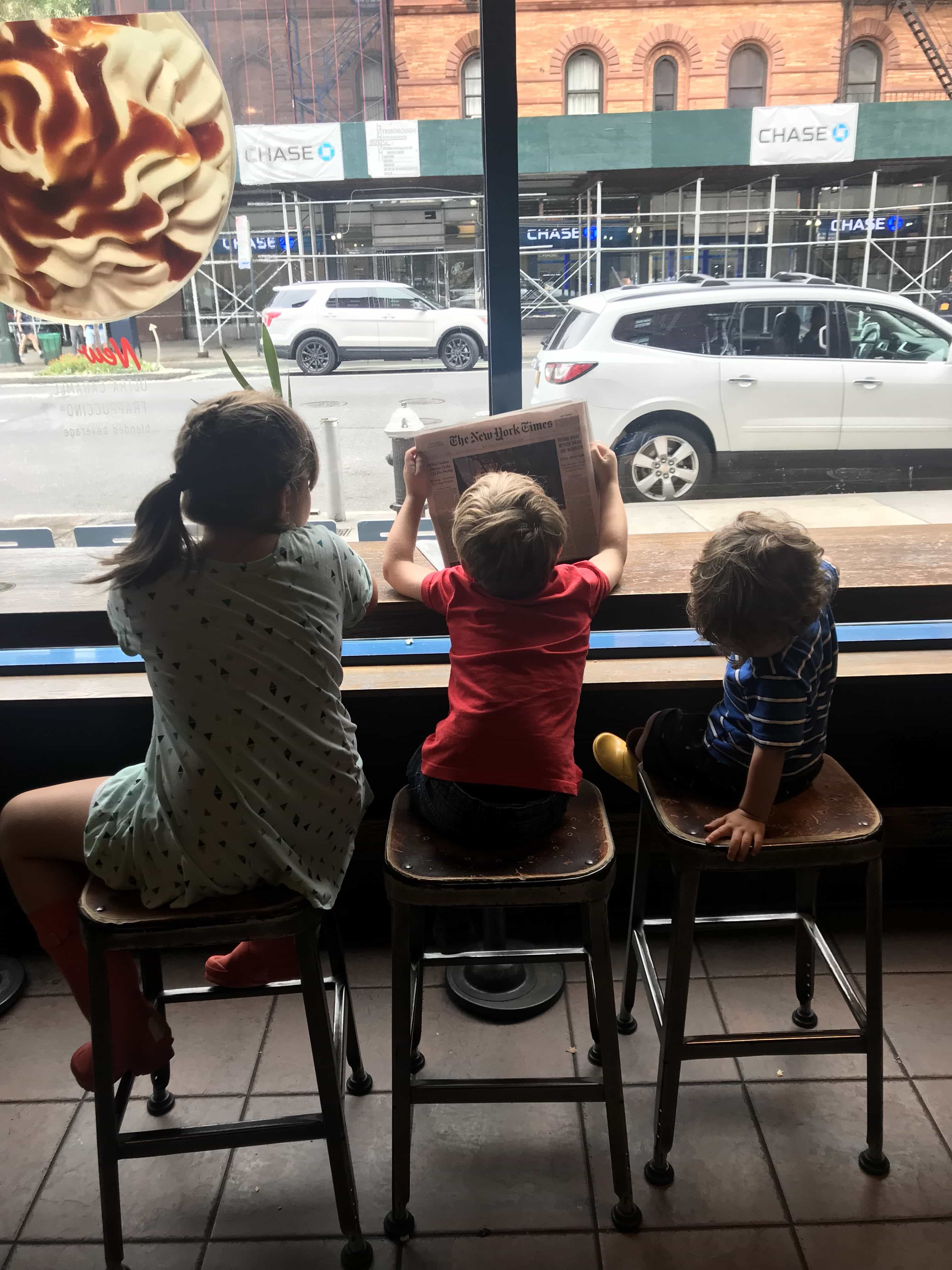 Kids sitting at a bar