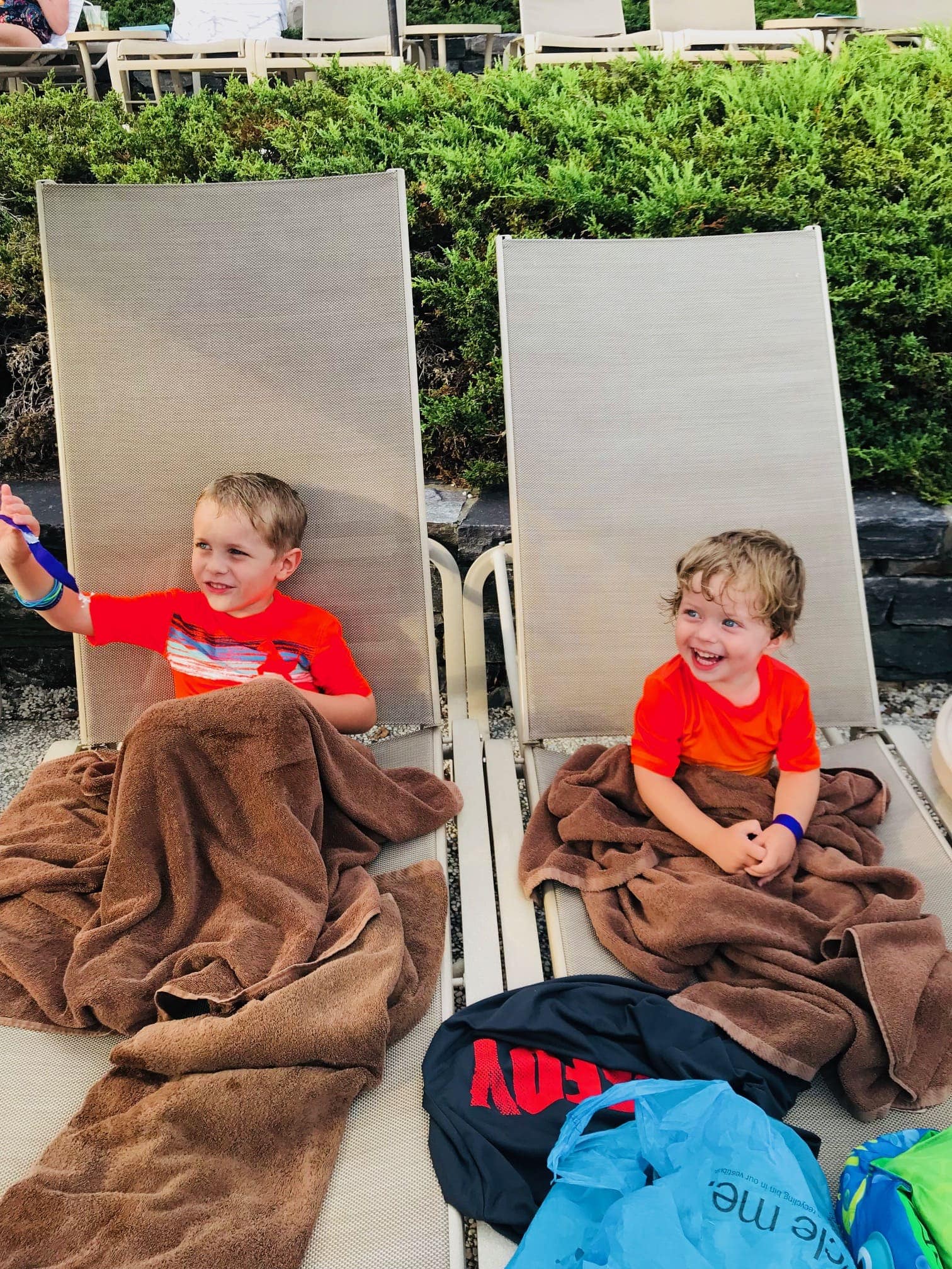 Blake and Eddie in lounge chairs with blankets