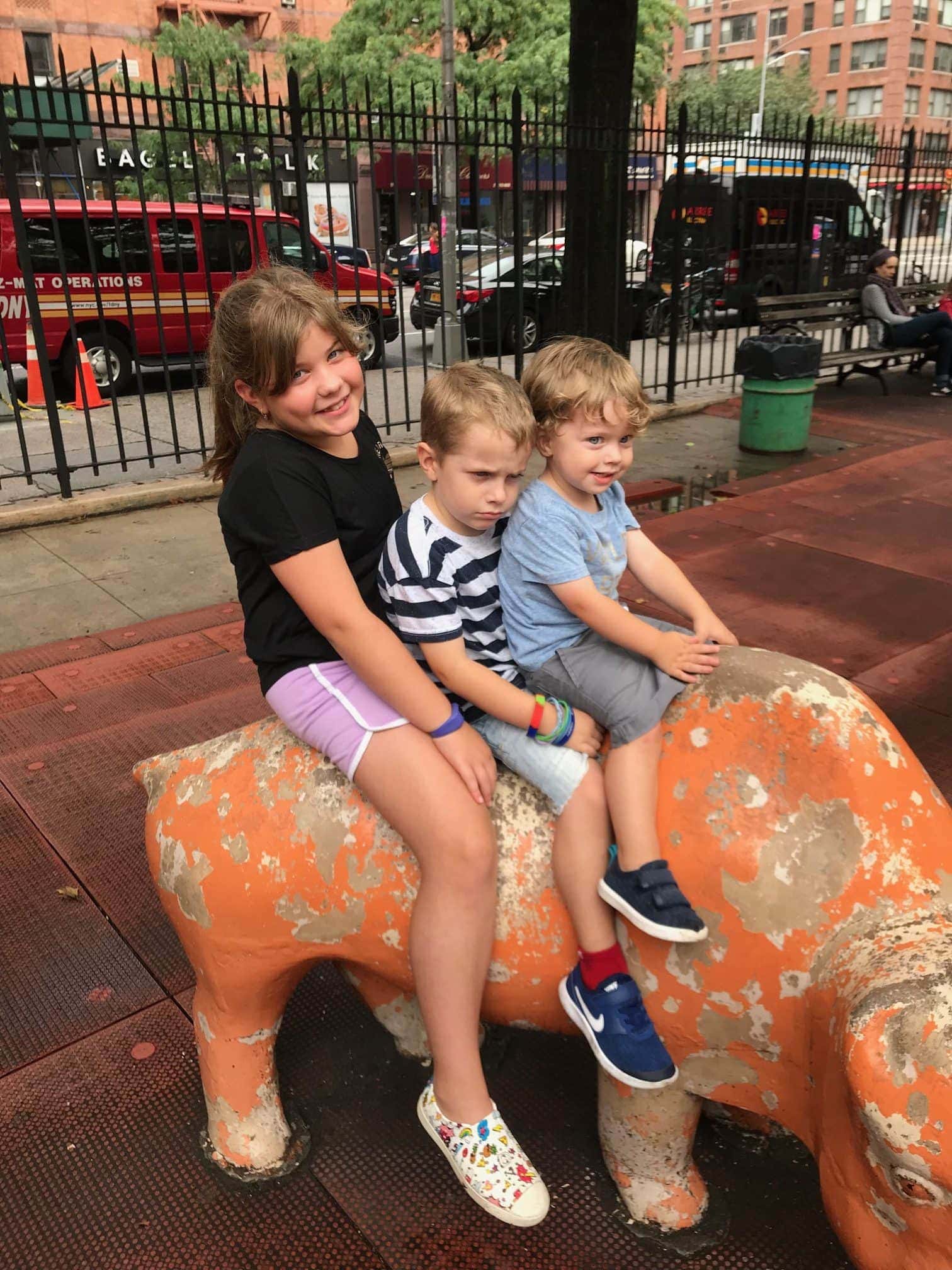 The kids on a statue