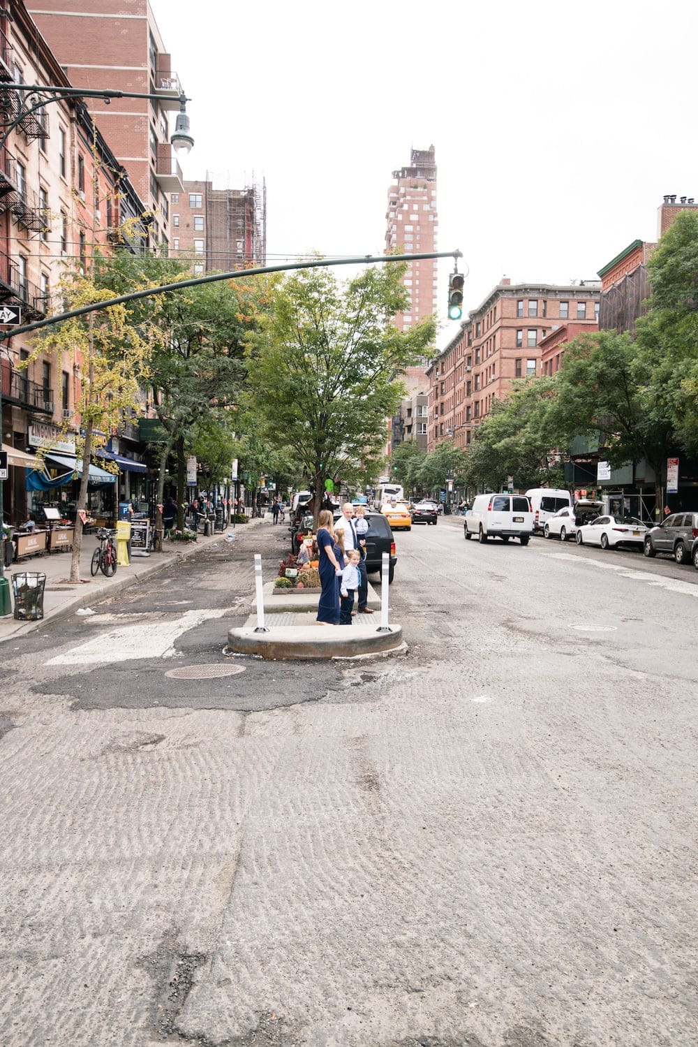 Brennan family crossing the street