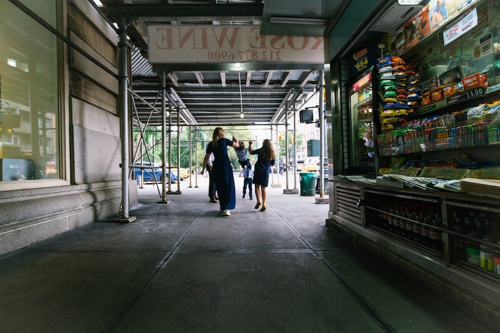 Brennan family walking down the sidewalk