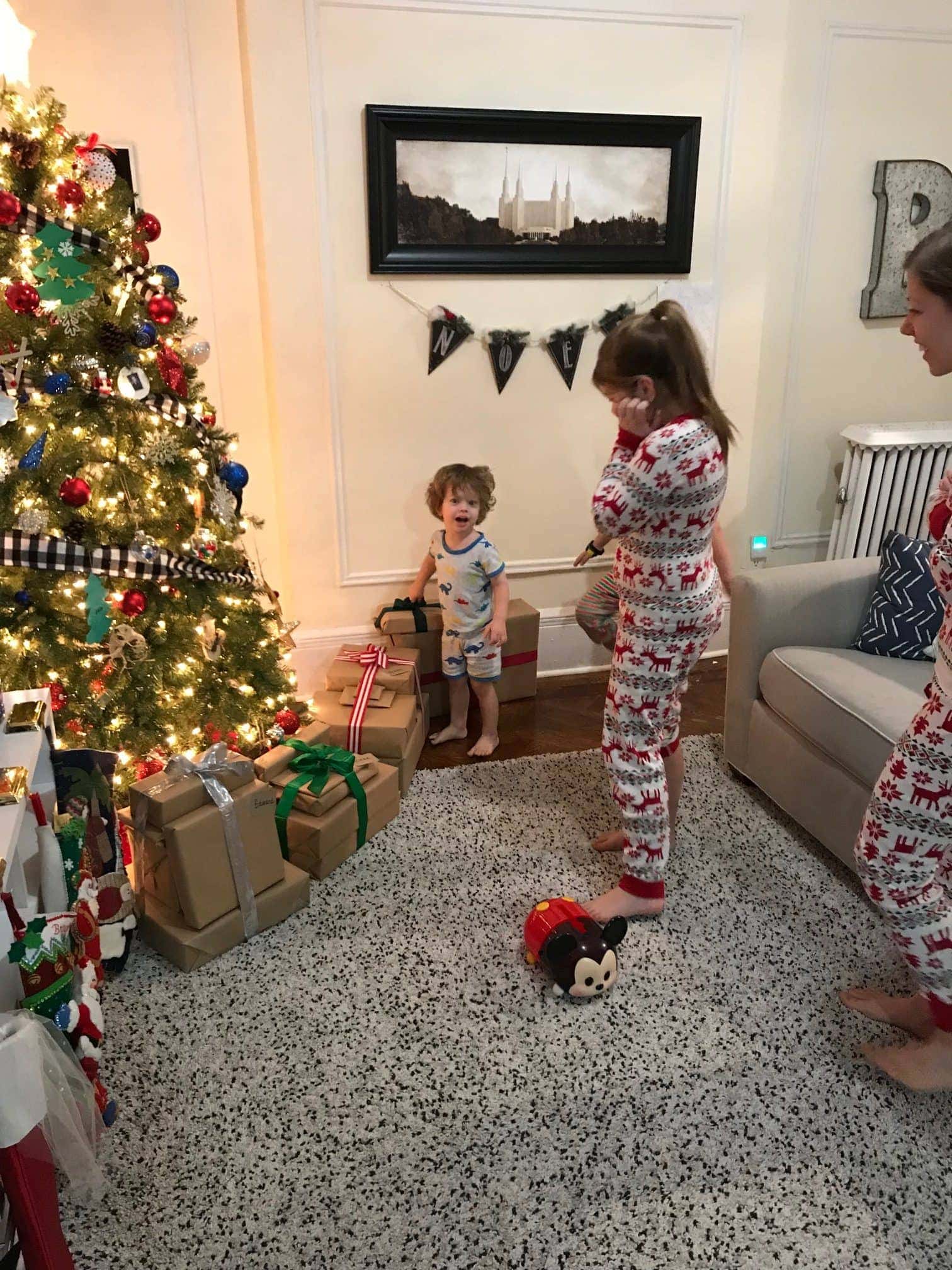 Kids looking at Christmas tree