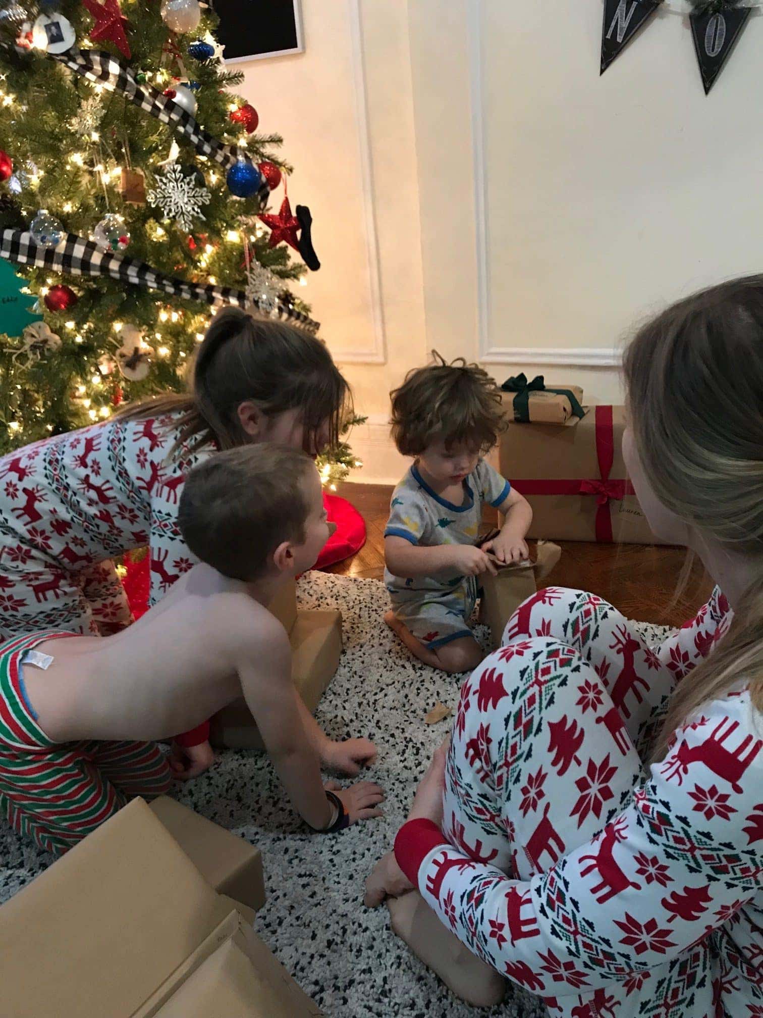 Kids opening presents