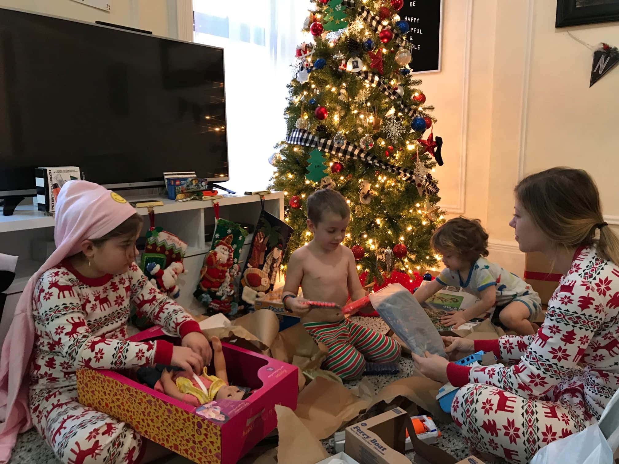 Kids opening presents