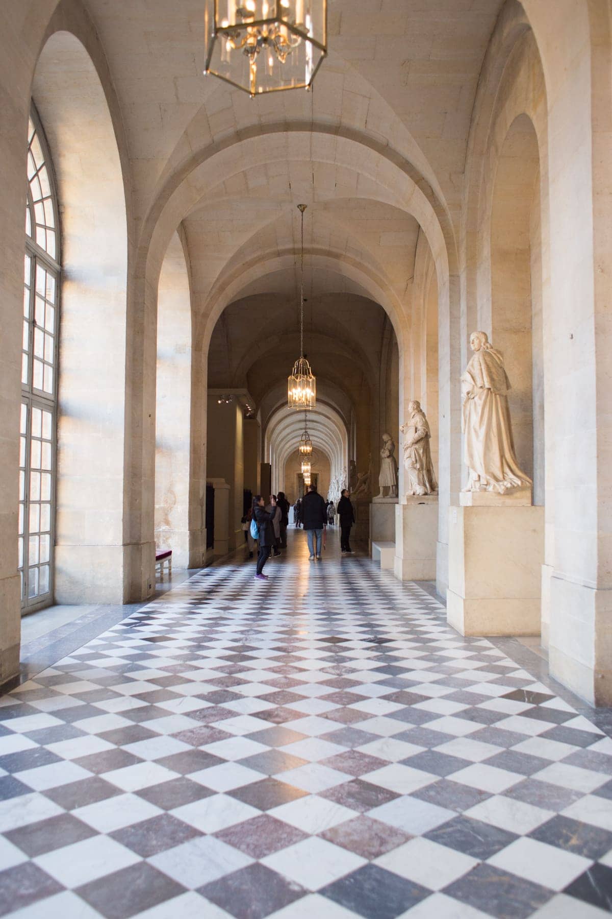 A large stone building with a tile floor