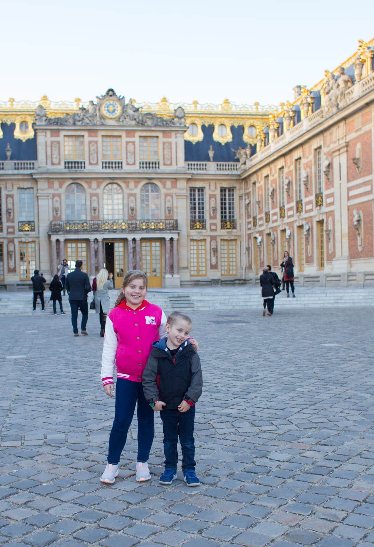 Brooke and Blake in front of palace