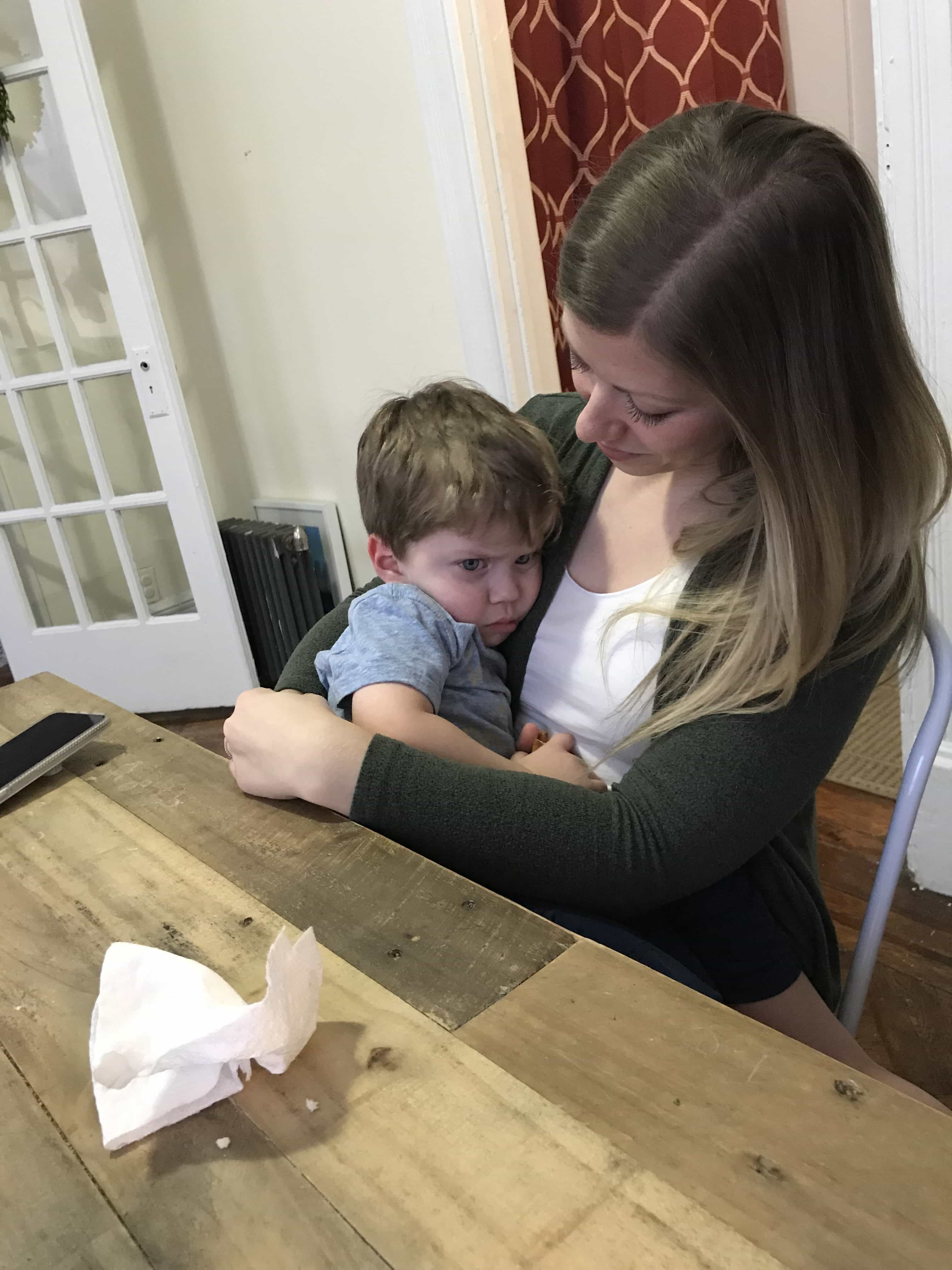 Lauren holding a pouting Eddie