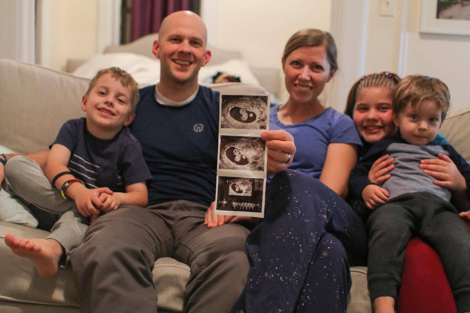 Brennan family sitting announcing pregnancy