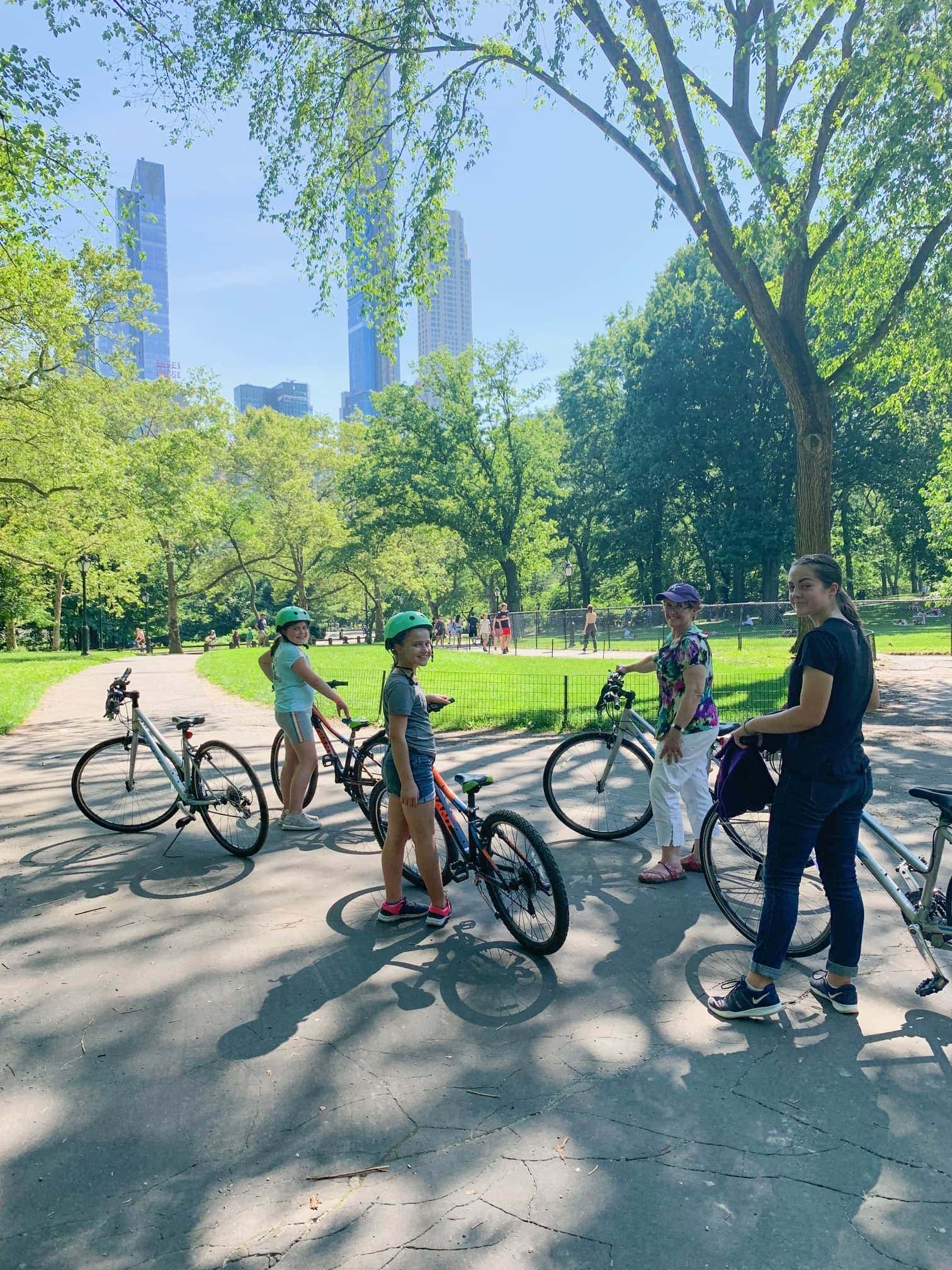 A group of people riding bicycles
