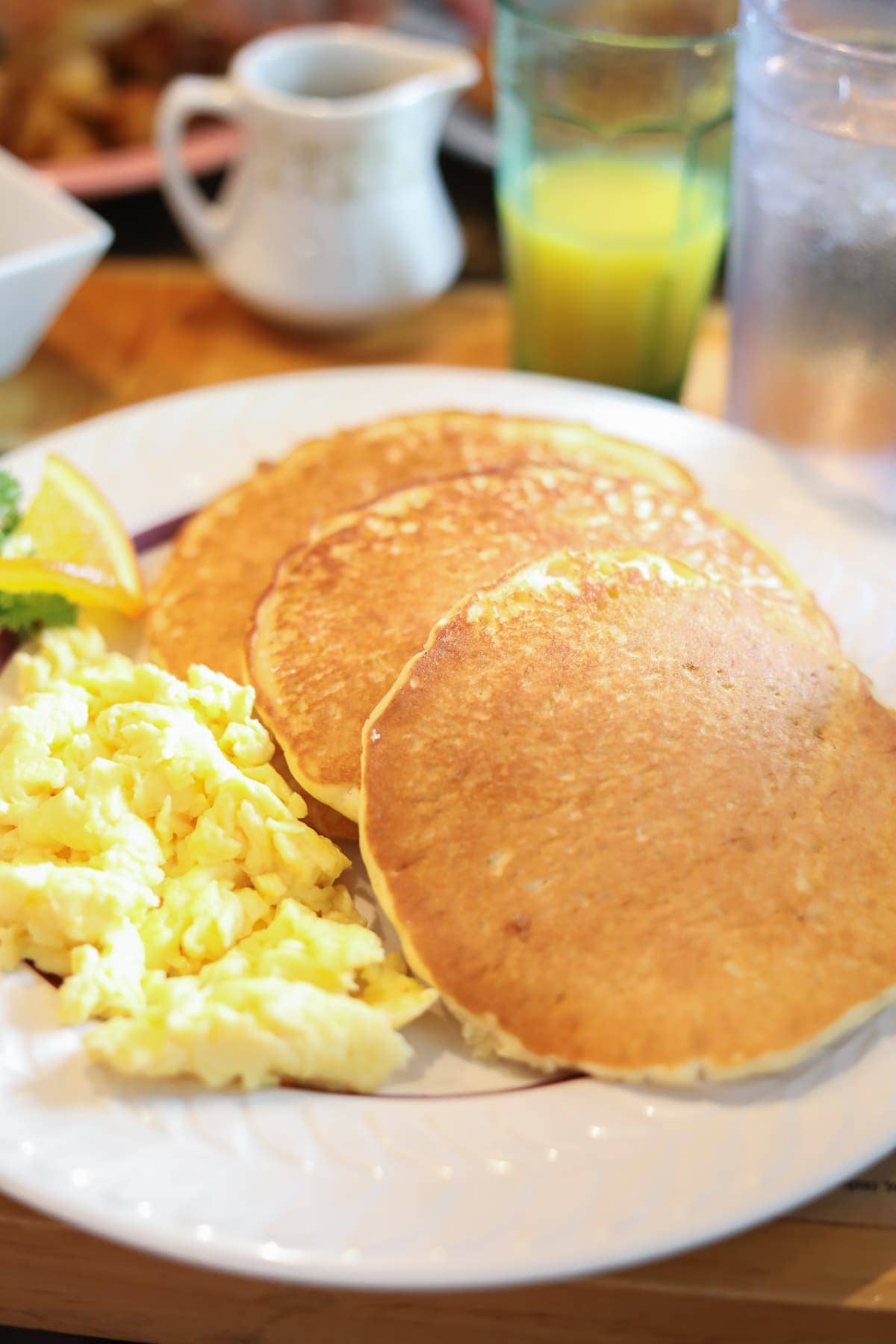 A plate of pancakes and eggs