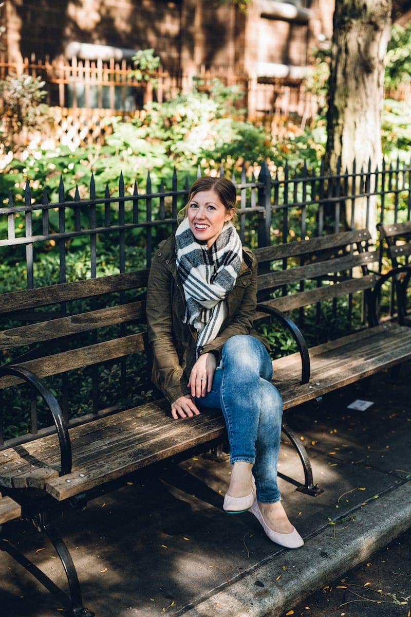 Lauren sitting on a park bench