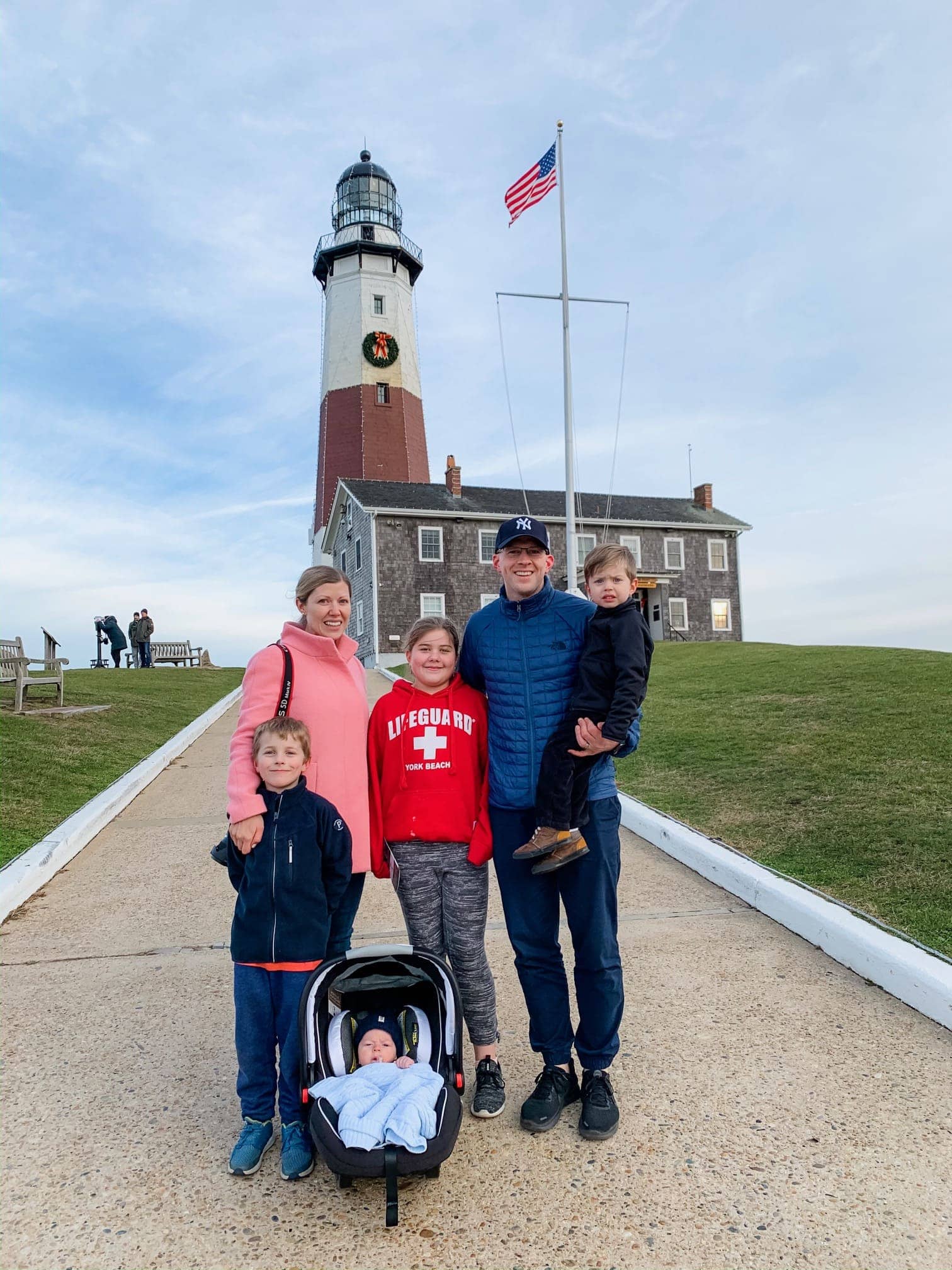 Brennan family in front of a lighthouse