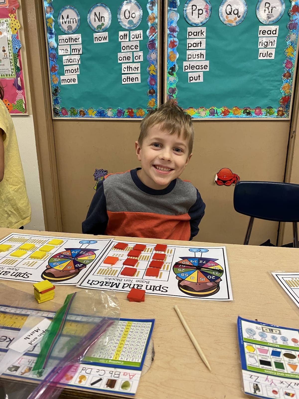 Blake sitting at a school table