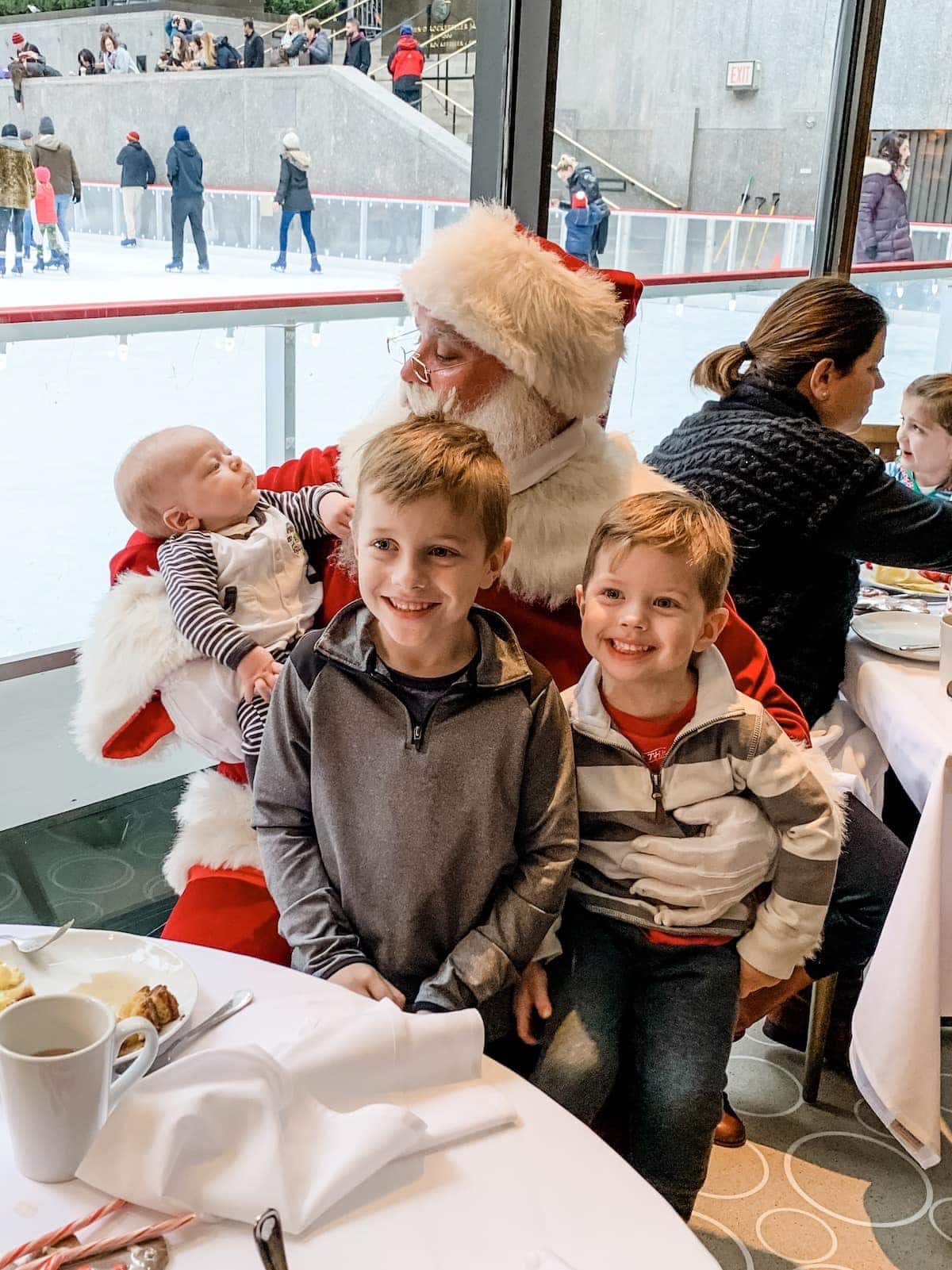 Blake, Porter and Eddie posing with Santa Claus