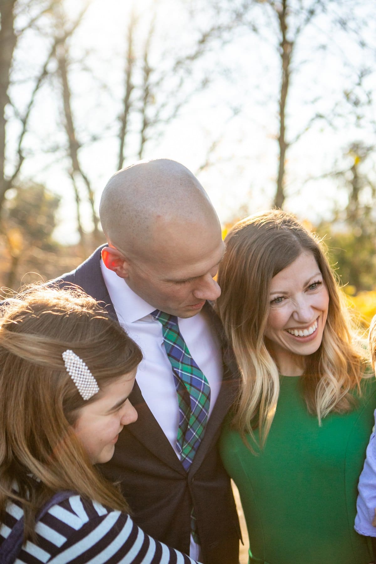 husband, wife and daughter
