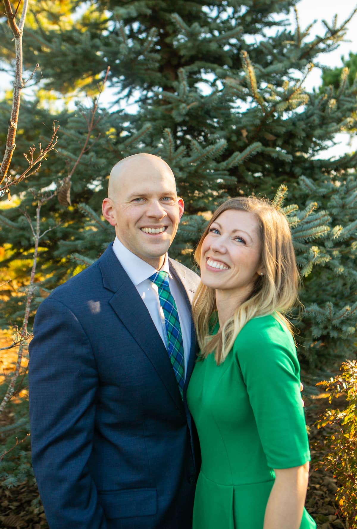 husband and wife smiling