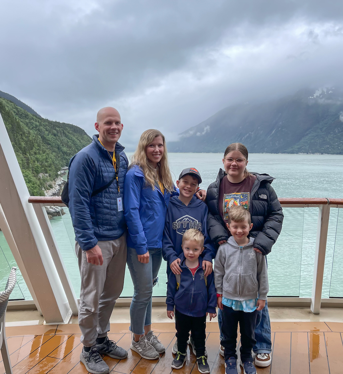 family smiling on cruise ship